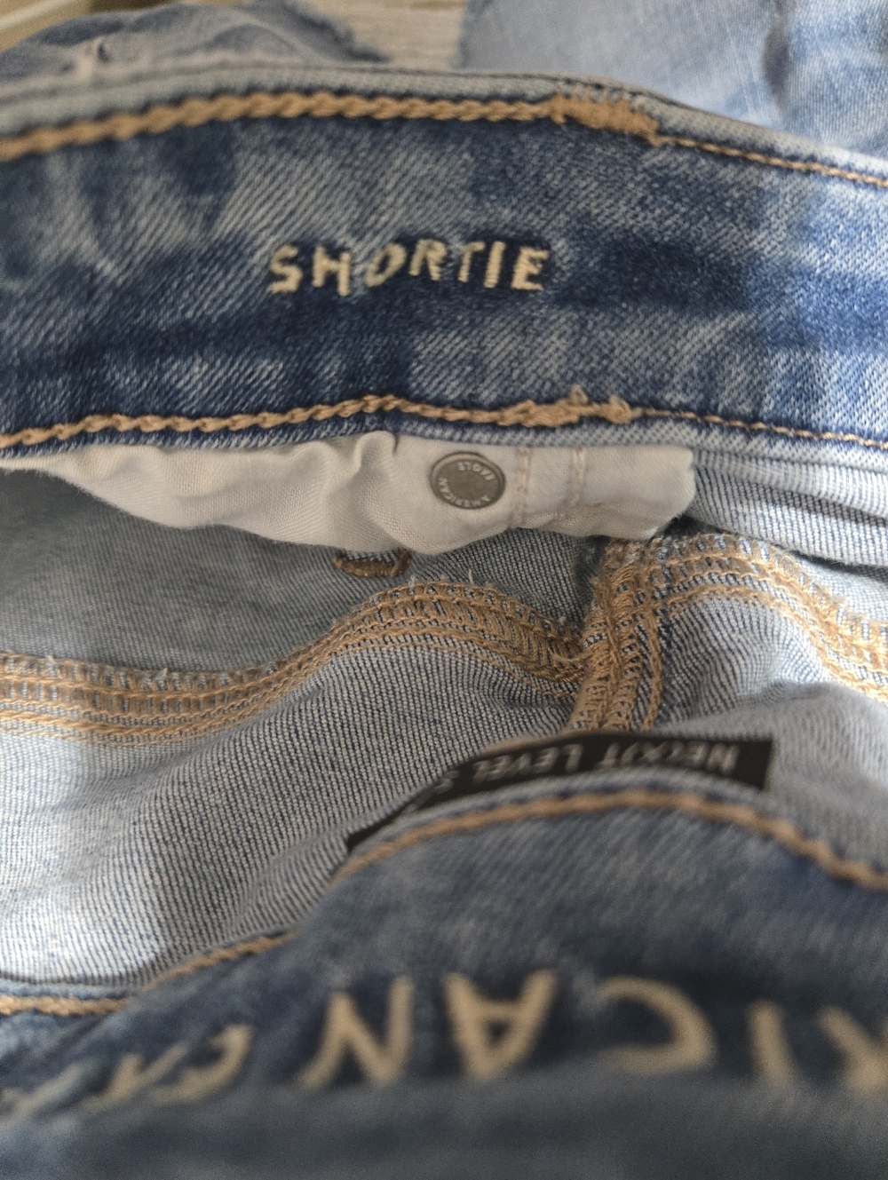 American Eagle Next Level Stretch Shortie Distressed Denim Shorts GUC Size: 16 - Picture 4 of 5